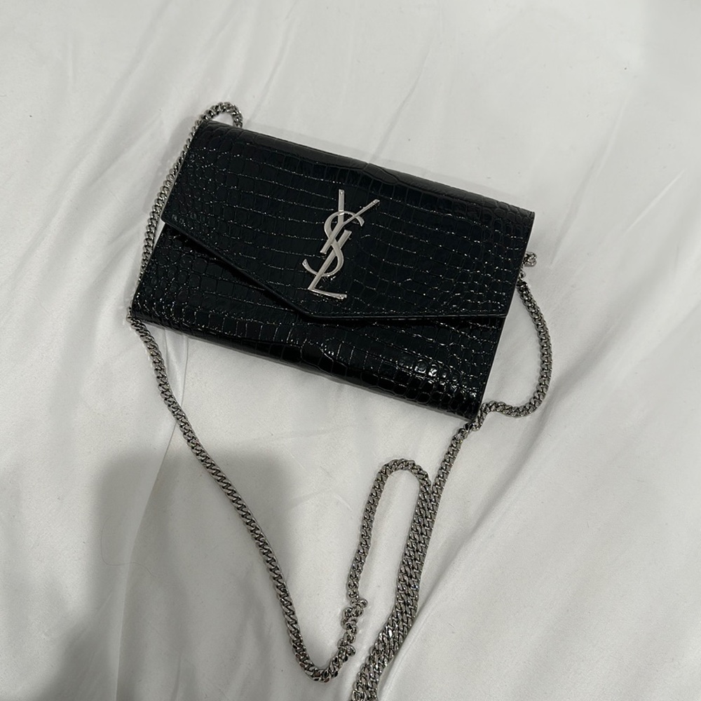 Uptown chain wallet in crocodile embossed shiny leather from YSL